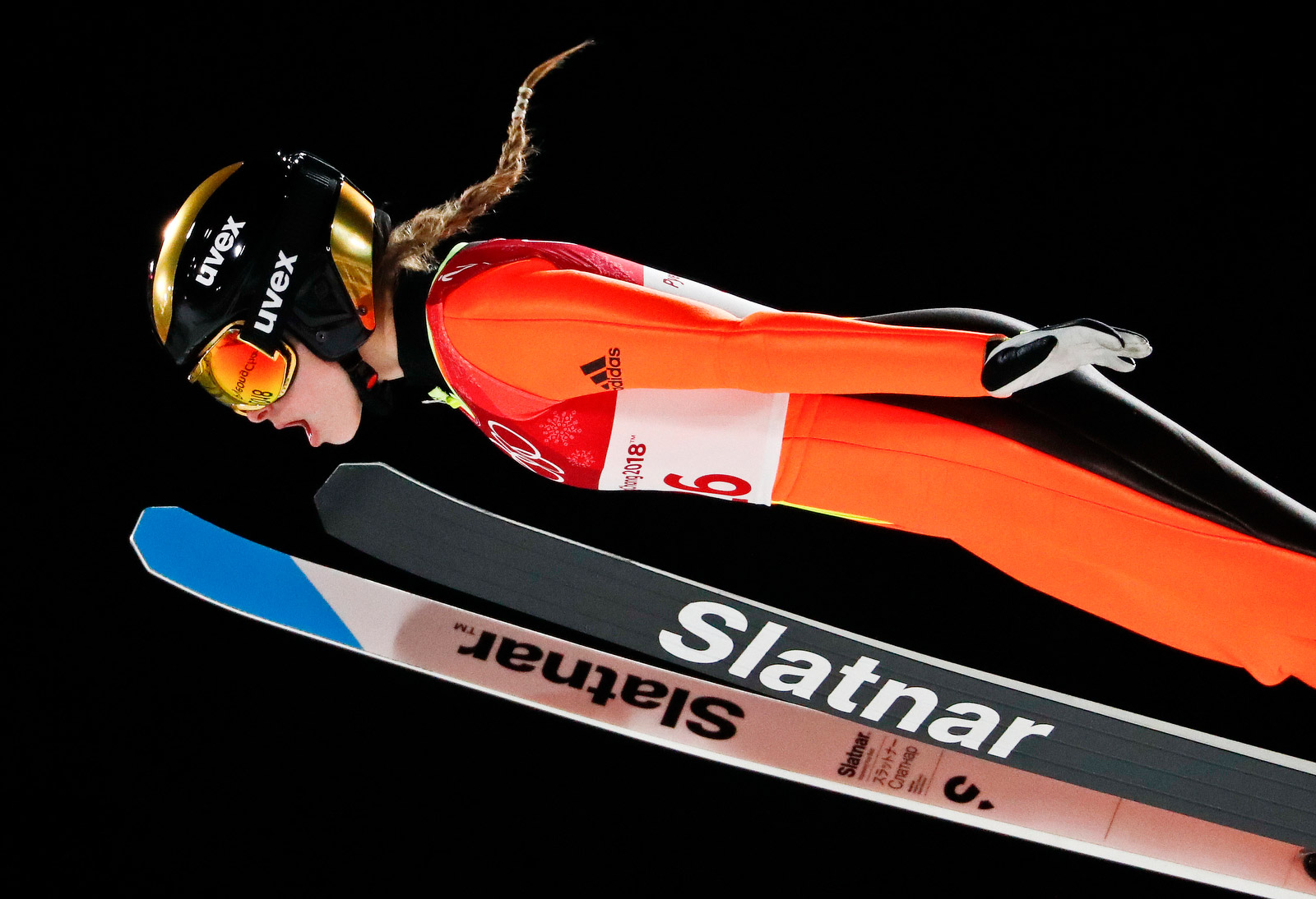 Slovenian ski jumper Nika Kriznar soars through the air on February 12. Matthias Schrader/AP