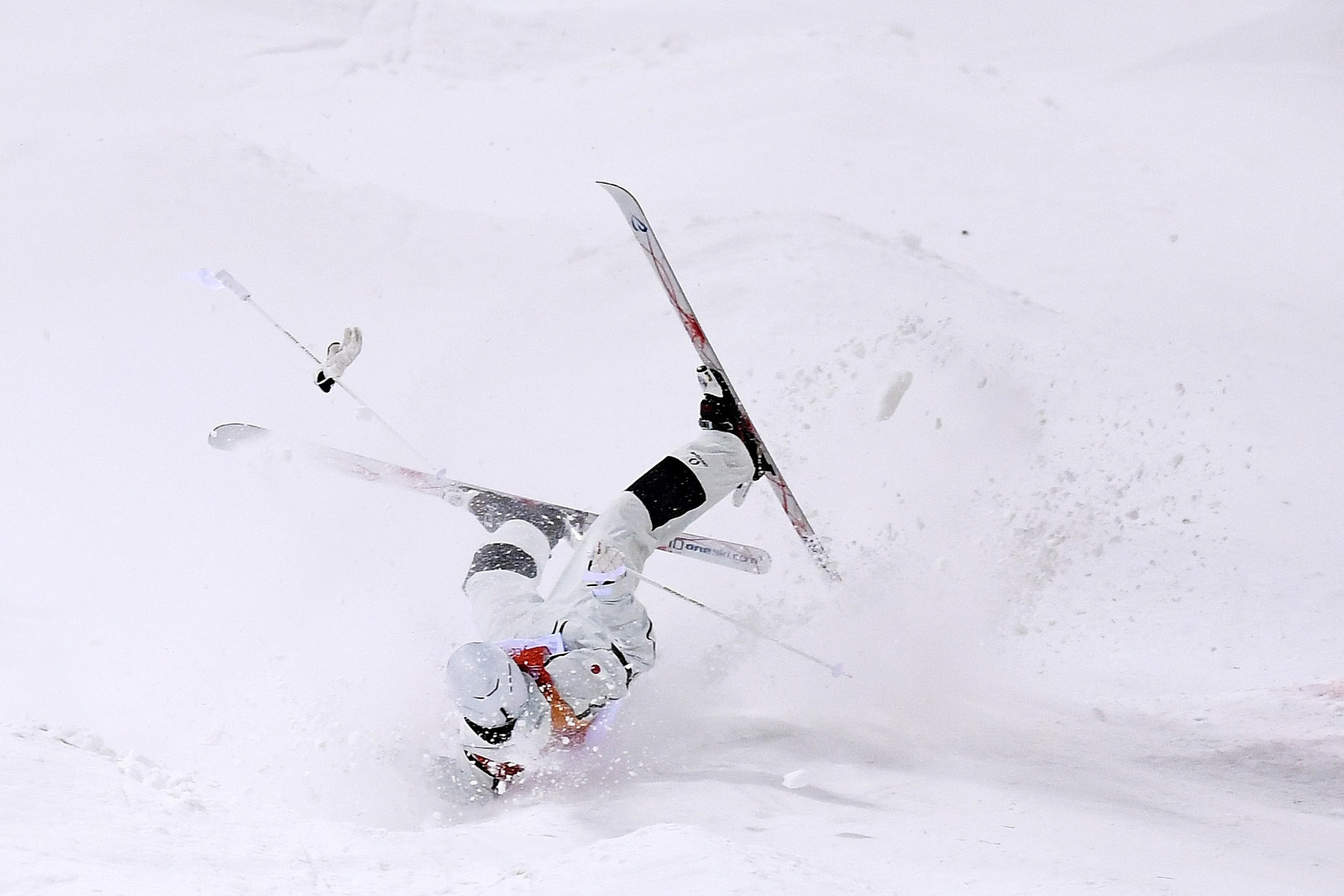 Japanese skier Ikuma Horishima crashes during the moguls event on February 12. David Ramos/Getty Images