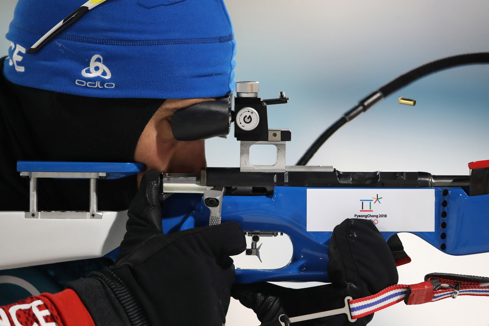 A bullet shell flies from the rifle of French biathlete Martin Fourcade, who won the 12-kilometer pursuit on February 12. It’s the third gold medal of Fourcade’s career and the fifth medal in all. He is the most decorated French athlete in Winter Olympics history. Sean M. Haffey/Getty Images