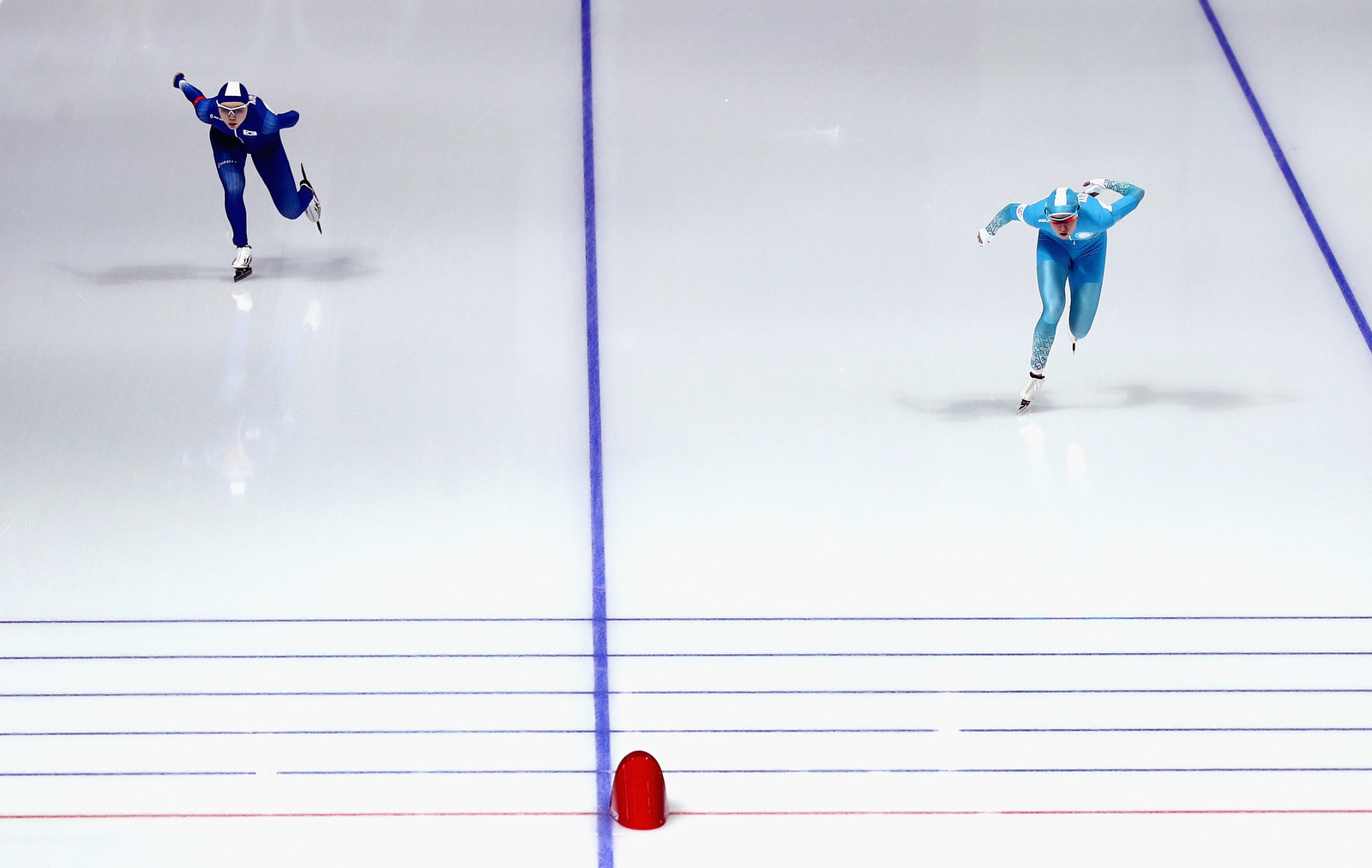 South Korea’s Noh Seon-yeong, left, and Kazakhstan’s Yekaterina Aidova skate in the final of the 1,500 meters. Maddie Meyer/Getty Images