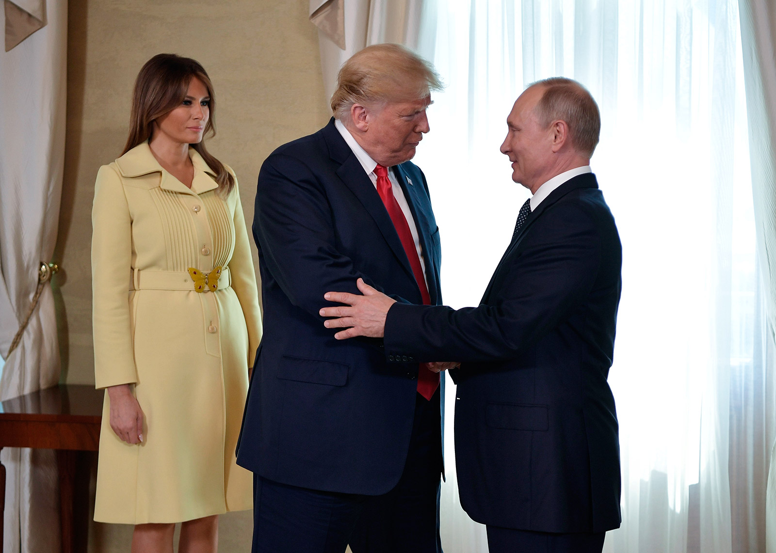 In pictures Trump meets with Putin