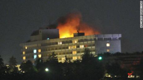 Flames light up the sky after the Kabul Intercontinental Hotel was attacked in 2011.