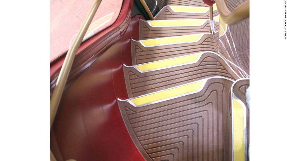 The characterful curved staircase of the old Routemasters has been given a modern twist.  