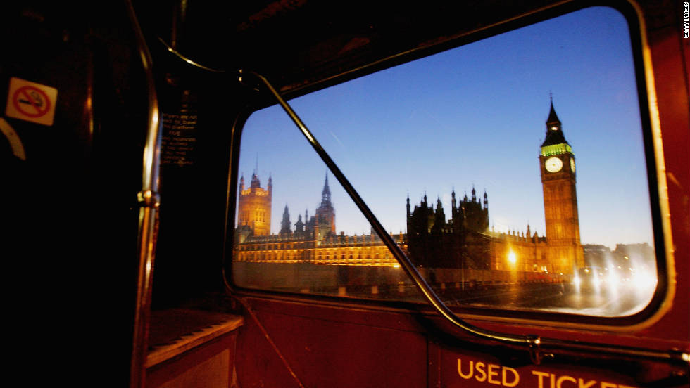 A view of the Houses of Parliament from Westminster Bridge, seen through the rear window of an old Routemaster.  