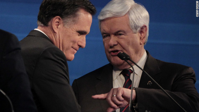 Former Massachusetts Gov. Mitt Romney and former House Speaker Newt Gingrich talk at the end of the South Carolina Republican presidential candidates debate in Myrtle Beach, SC, Monday, January 16, 2012. 
