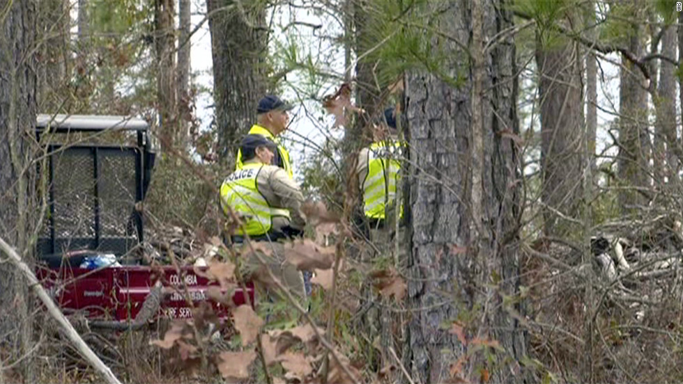 South Carolina authorities search a wooded area Thursday for missing toddler Amir Jennings, who vanished in November.