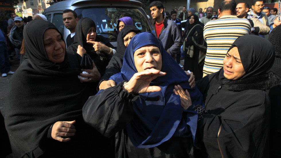 Egyptian women mourn victims of the riot at a morgue in Cairo on February 2.