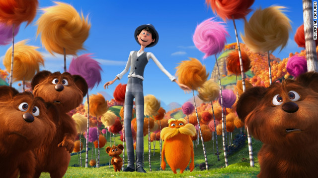 This photo of the 2012 animated film shows the orange character of Lorax in the center, surrounded by colorful truffles.