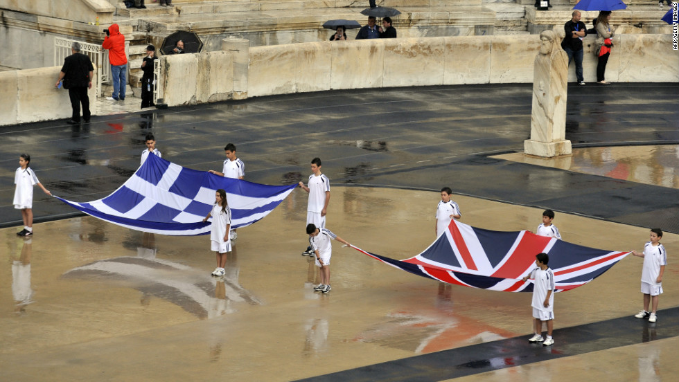 Greece Passes Olympic Flame To Britain Cnn