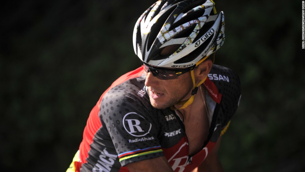 Armstrong looks back as he rides during the 2010 Tour de France.