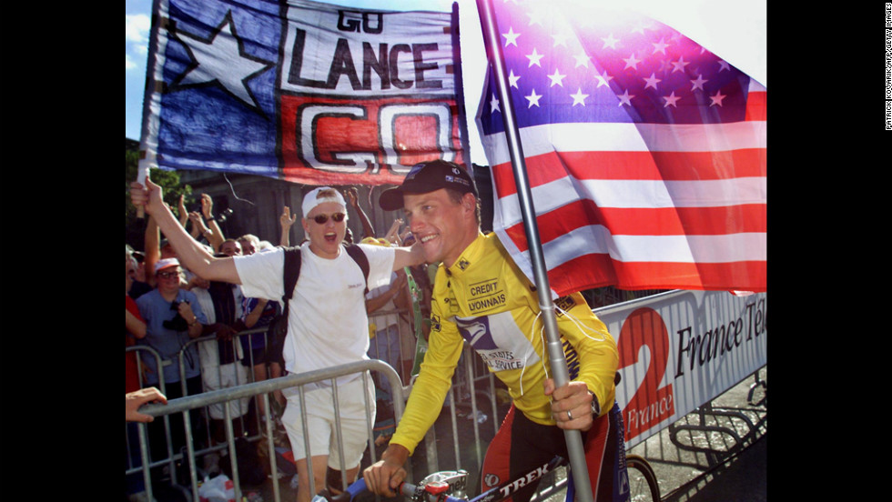 Armstrong takes his honor lap on the Champs-Élysées in Paris after winning the Tour de France for the first time in 1999.