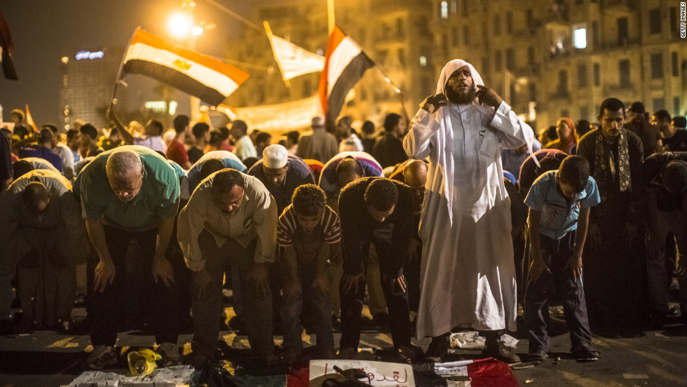 Egyptians pray in Tahrir Square on Thursday during a protest against presidential candidate Ahmed Shafik.