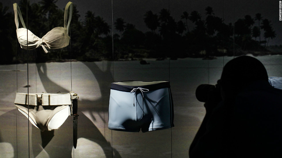 The bikini worn by Honey Ryder, the first Bond Girl in &quot;Dr. No,&quot; sits alongside the famously tiny trunks worn by current Bond actor Daniel Craig in 2006&#39;s &quot;Casino Royale.&quot; 