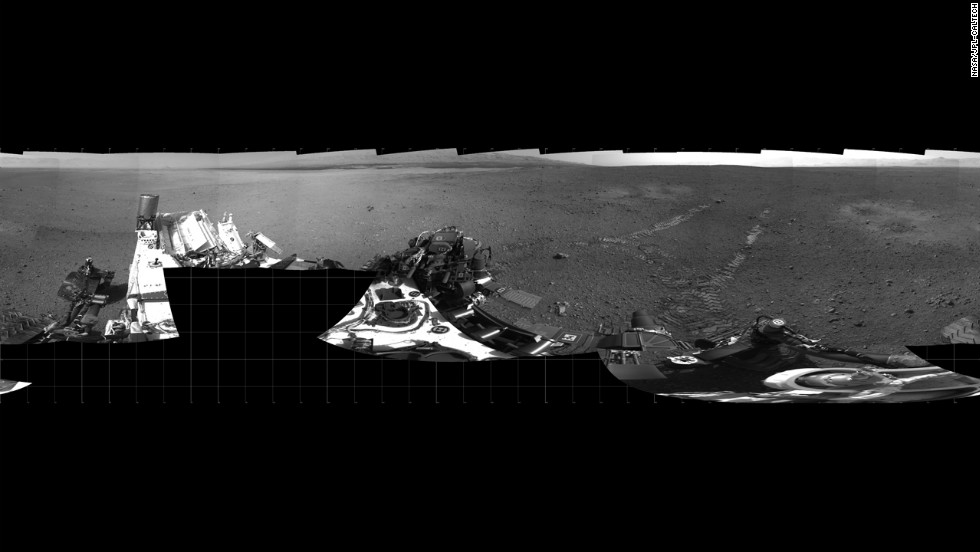 The Mars rover Curiosity moved about 15 feet forward and then reversed about 8 feet during its first test drive on August 22, 2012. The rover&#39;s tracks can be seen in the right portion of this panorama taken by the rover&#39;s navigation camera.  