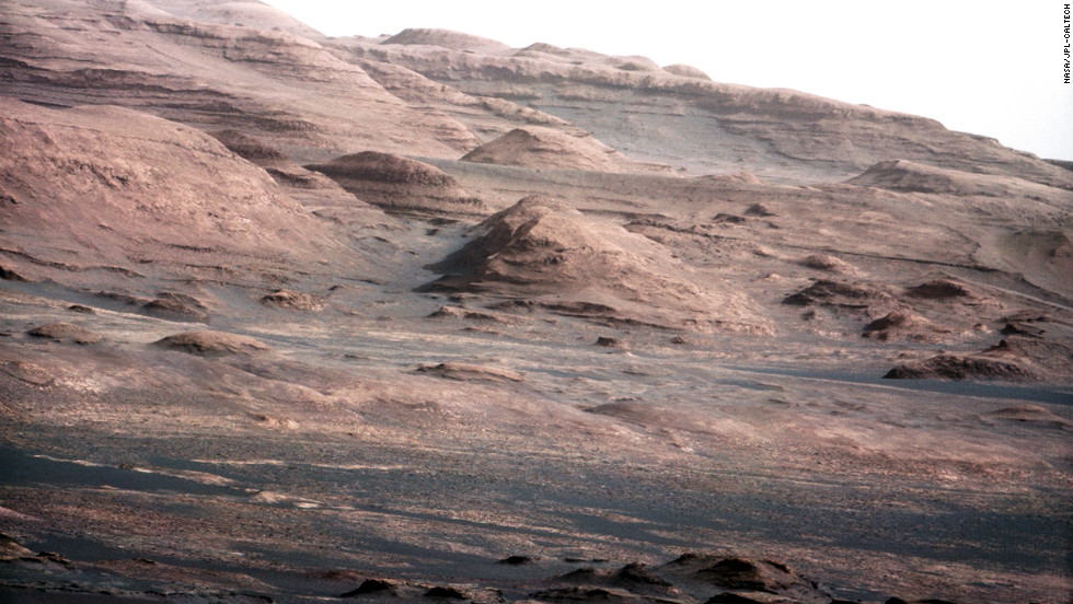 An image released August 27, 2012, was taken with Curiosity rover&#39;s 100-millimeter mast camera, NASA says. The image shows &quot;Mount Sharp&quot; on the Martian surface. NASA says the rover will go to this area. 