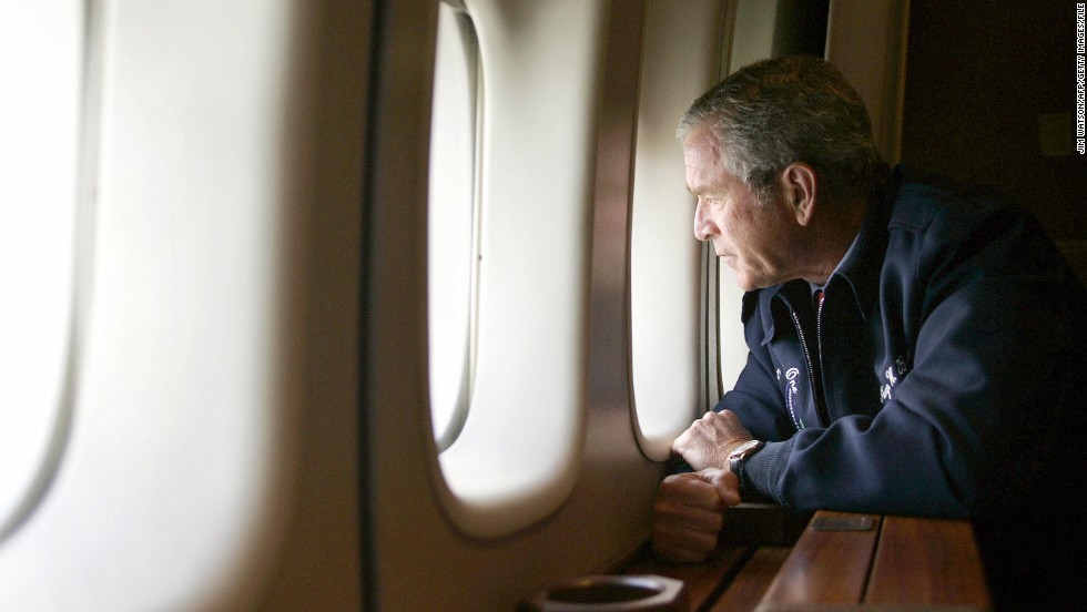 President George W. Bush looks out the window of Air Force One on August 31, 2005, as he flies over New Orleans. Returning to Washington from Texas, Air Force One descended to about 5,000 feet to allow Bush to view some of the worst damage from Hurricane Katrina.