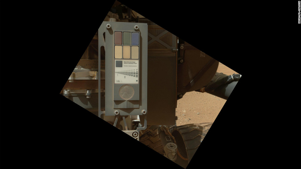 This is the calibration target for the imager. This image, taken on September 9, 2012, shows that the surface of the calibration target is covered with a layor of dust as a result of the landing. The calibration target includes color references, a metric bar graphic, a penny for scale comparison, and a stair-step pattern for depth calibration. 