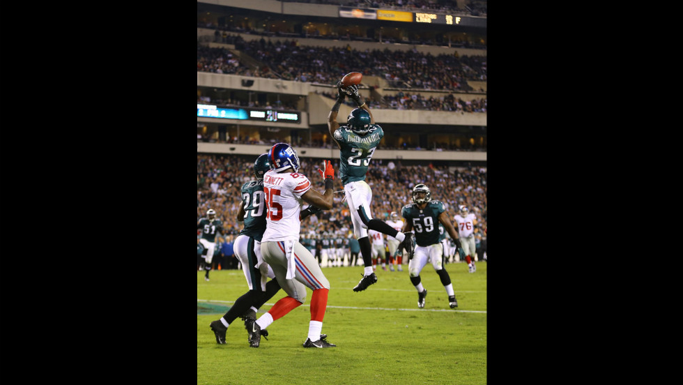 Dominique Rodgers-Cromartie of the Eagles intercepts a pass in the end zone thrown by Giants quarterback Eli Manning during Sunday's game.