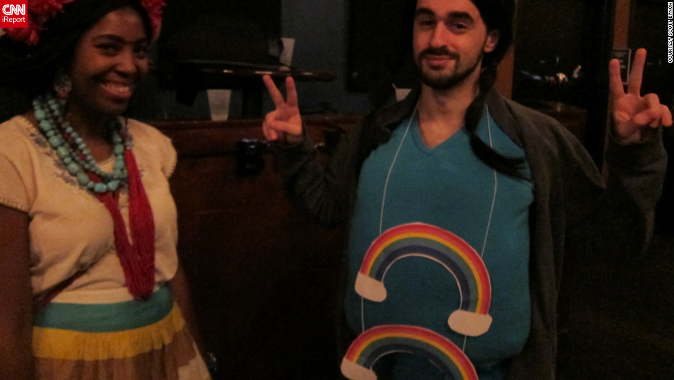 The man on the right is sporting the Double Rainbow meme at the <a href="http://ireport.cnn.com/docs/DOC-864935">HallowMEME</a> costume party. The <a href="http://knowyourmeme.com/memes/double-rainbow" target="_blank">Double Rainbow</a> became an Internet sensation after the video "Yosemitebear Mountain Giant Double Rainbow 1-8-10" went viral online.