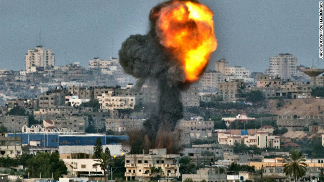 A picture taken from the southern Israeli Gaza border shows smoke billowing from a spot targeted by an Israeli air strike inside the Gaza strip on Friday.