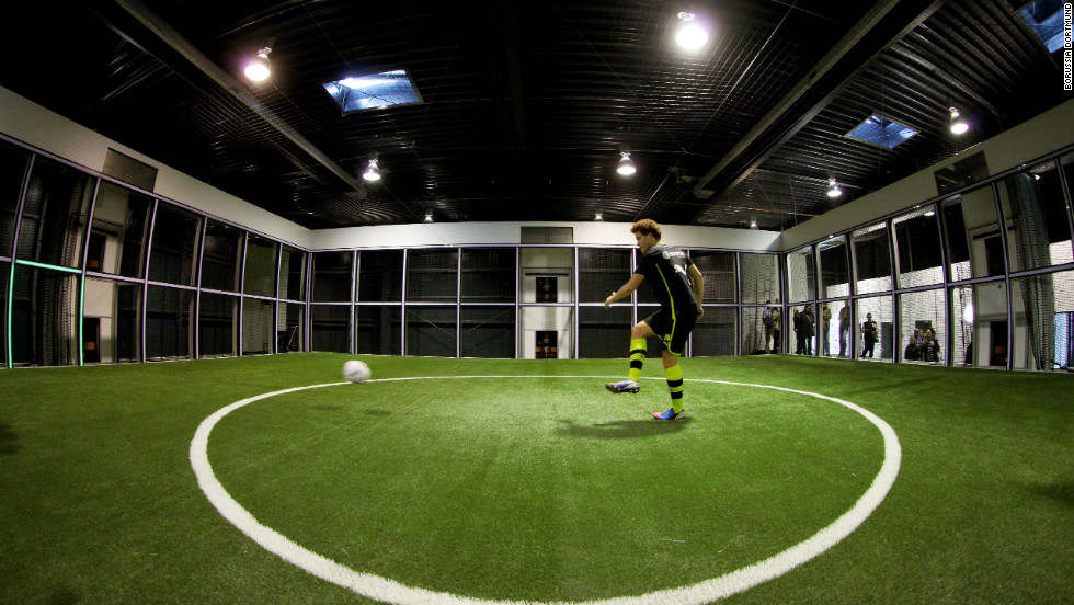 The &quot;Footbonaut&quot; -- is a robotic cage which footballers can use to improve passing, spatial awareness and control. The machine is being used by German champions Borussia Dortmund.