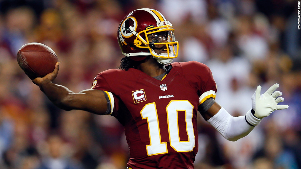 Redskins quarterback Robert Griffin III throws the ball on Monday against the Giants.