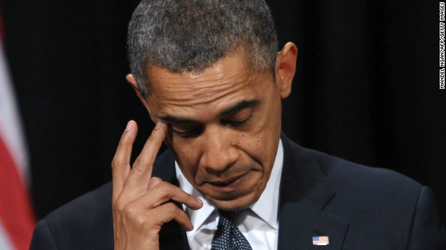 President Obama appears to dab at a tear while speaking to the crowd.
