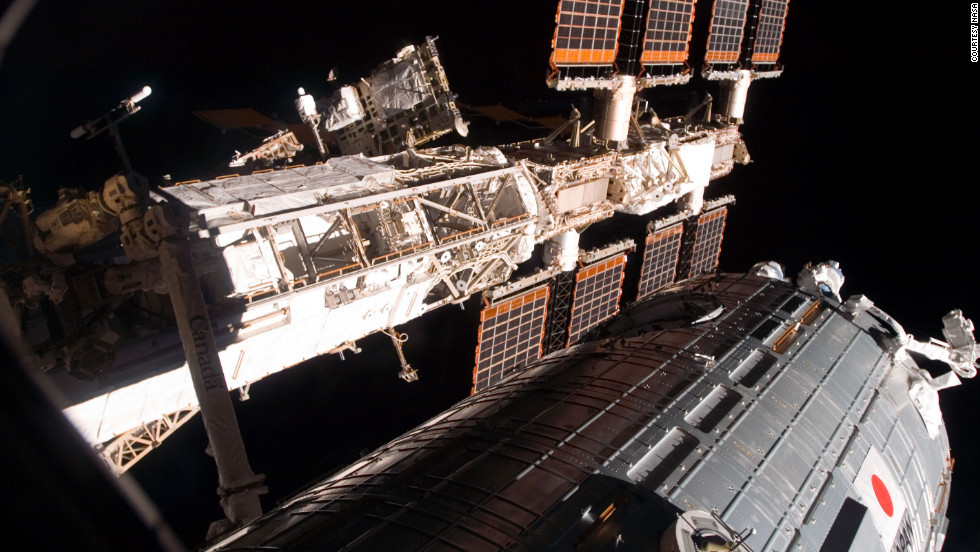 The space shuttle Discovery leaves the space station in March 2008 after its crew successfully delivered and installed the Japanese-built Kibo lab.