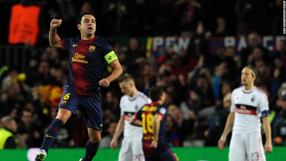 Xavi, captaining the side in place of Carles Puyol, jumps for joy after Messi&#39;s early strike. Barcelona looked a completely different side to that which lost at San Siro three weeks ago as it  piled the pressure on Milan.