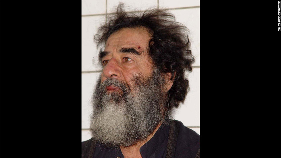 Saddam Hussein&#39;s picture is taken December 14, 2003, after his capture a day earlier. U.S. troops found Hussein hiding near his hometown of Tikrit.