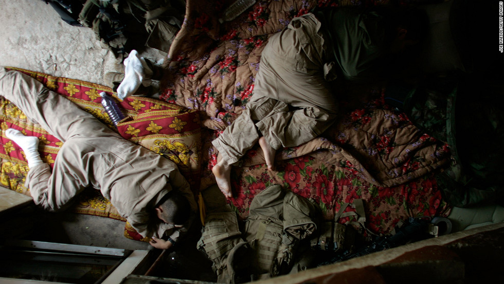 U.S. Marines sleep at their patrol base in the area known as Zaidon in Al Anbar province on May 12, 2007.