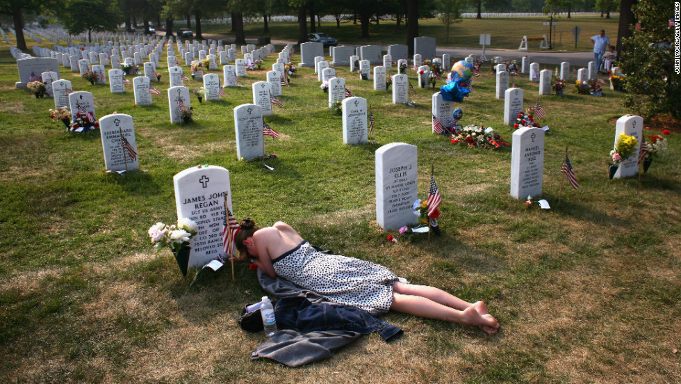 Mary McHugh mourns her fiance, Sgt. James Regan, at Arlington National Cemetery in Washington on May 27, 2007. The American Special Forces soldier was killed by an IED in Iraq in February.