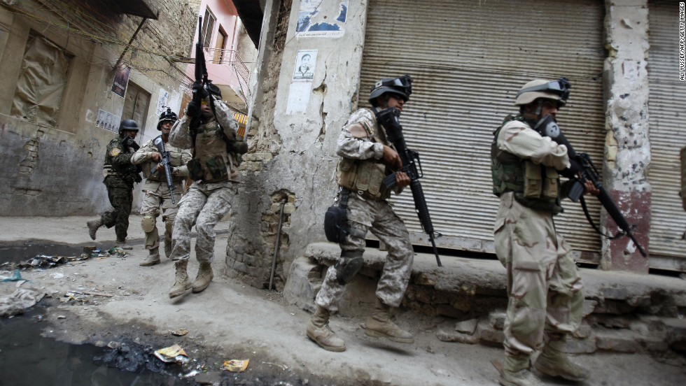 Iraqi army special forces patrol Baghdad&#39;s al-Fadel district on March 30, 2009. U.S.-backed Iraqi forces clashed with anti-al-Qaeda militants known as the Awakening Council, or Sahwa, after fighting erupted following the arrest of Adel Mashhadani, a Sahwa leader.