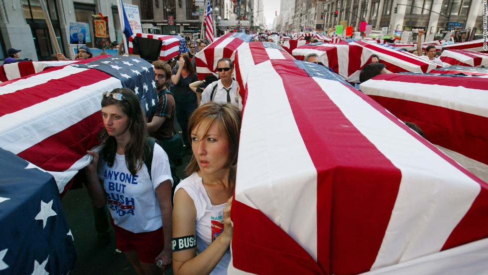 Anti-war protesters in New York carry mock coffins draped with U.S. flags on August 29, 2004. Thousands took part in demonstrations outside Madison Square Garden on the eve of the Republican National Convention.
