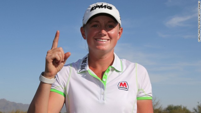 American Stacy Lewis became just the seventh player to top the Rolex World Rankings.
