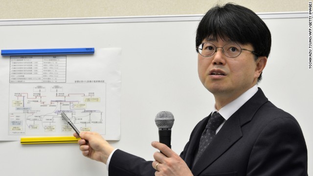 Masayuki Ono (2nd L), acting head of Tokyo Electric Power Co (TEPCO) nuclear power and facilities section speaks at a news conference at the company&#39;s headquarters in Tokyo on March 19, 2013. 