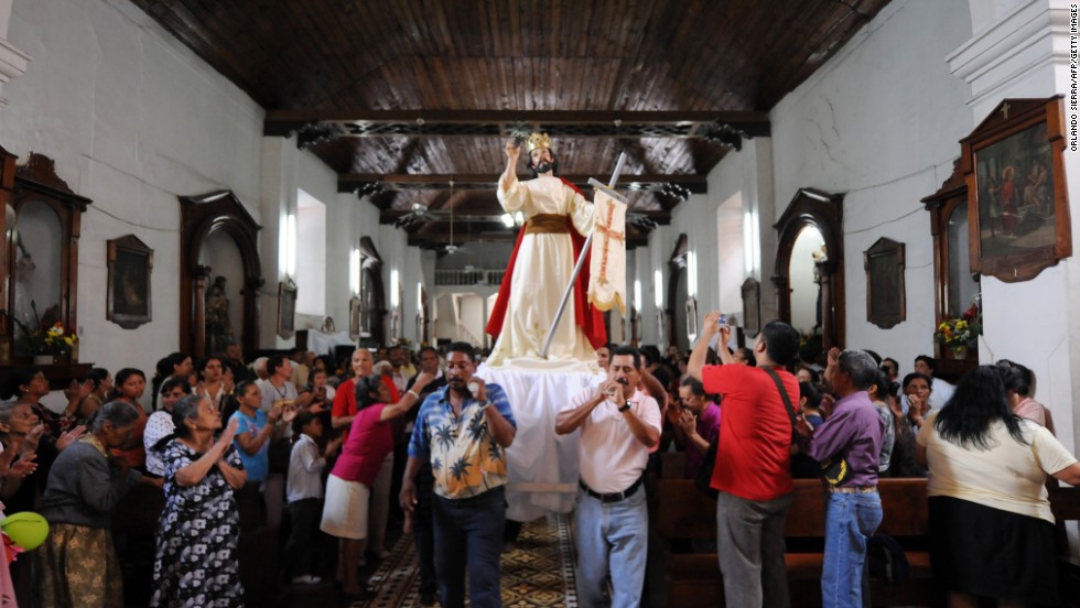 Catholic faithful participate in the Easter Sunday procession in Tegucigalpa, Honduras, on March 31.
