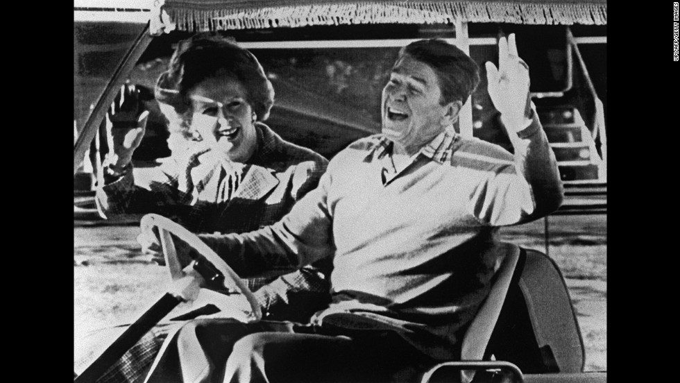 Reagan and Thatcher take a golf cart around Camp David in December 1984.