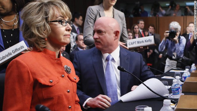 Giffords and Kelly arrive for a Senate Judiciary Committee hearing about gun control on Capitol Hill in Washington on January 30, 2013. The former congresswoman delivered an opening statment to the committee, which met for the first time since the mass shooting at a Sandy Hook Elementary School in Newtown, Connecticut.