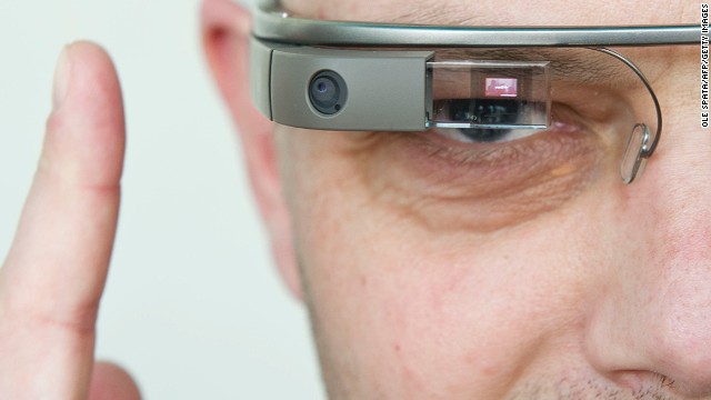 A visitor of the &#39;NEXT Berlin&#39; technology conference tries out Google Glass, a wearable computer that responds to voice commands and displays information before your eyes. It is expected to go to market in late 2013.