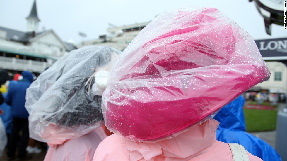 Derby hats are swathed in plastic to keep out the wet.