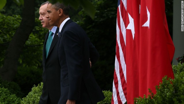 U.S. President Barack Obama (R) and Prime Minister Recep Tayyip Erdogan of Turkey walk into the Rose Garden to speak to the media at the White House, May 16, 2013 in Washington, DC.