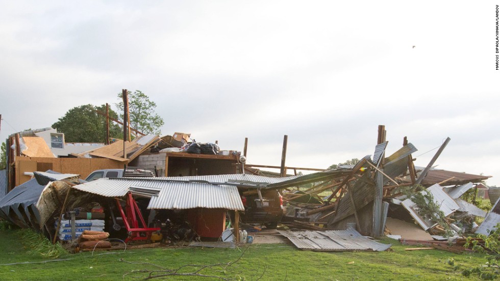 A home in Shawnee sits in ruin after being hit by a tornado on Sunday, May 19.