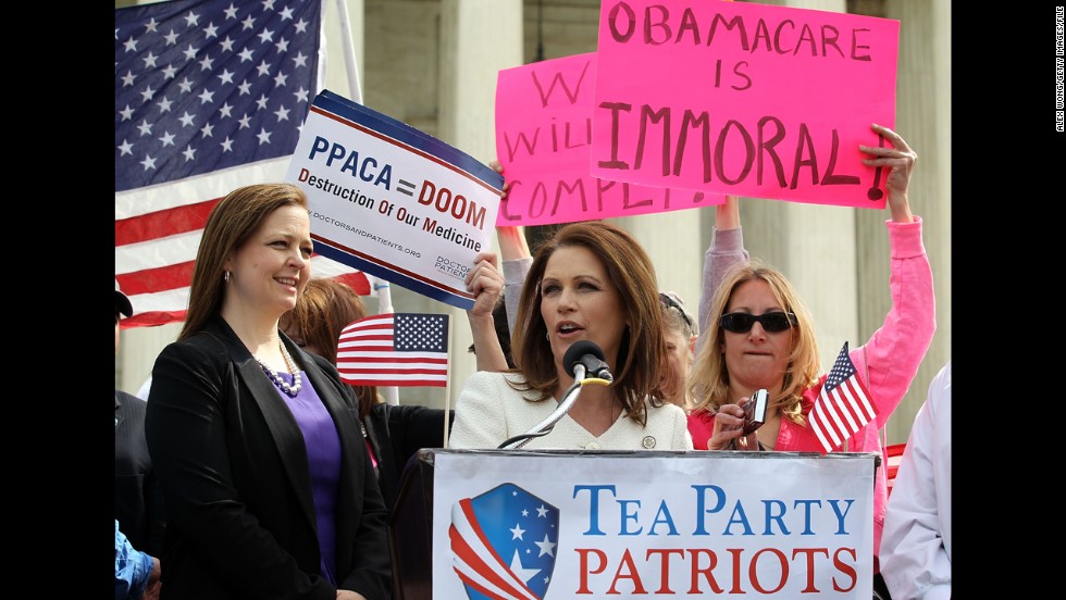 Bachmann addresses a rally with Tea Party Patriots national coordinator Jenny Beth Martin, left, in front of the U.S. Supreme Court in March 2012. The high court was hearing oral arguments on the constitutionality of the Patient Protection and Affordable Care Act, or Obamacare, which Bachmann has fiercely opposed.