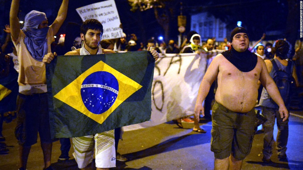 The mood on the streets of Rio de Janeiro remained hostile as Brazil and Spain took to the pitch.