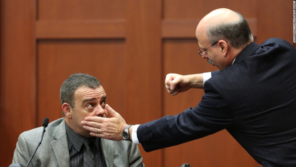 Prosecutor Bernie de la Rionda, on July 2, demonstrates a possible scenario while questioning state witness Chris Serino, a Sanford police officer.