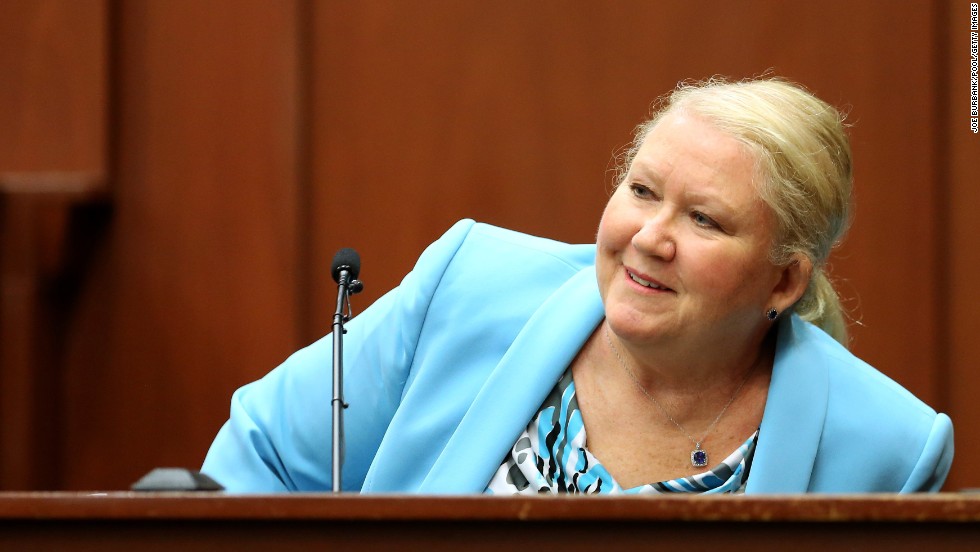 Leanne Benjamin, a friend of Zimmerman&#39;s, smiles while identifying him in court on July 8.