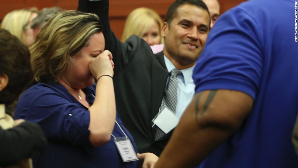 George Zimmerman&#39;s wife, Shellie Zimmerman, cries as friends and family members celebrate the verdict on July 13. 