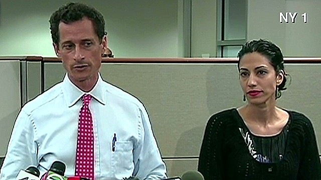 Weiner apologizes with wife at his side