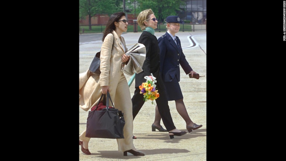 Serving as Clinton&#39;s personal aide, Abedin accompanies Clinton on a trip from New York  to Andrews Air Force Base in Maryland on May 6, 2000, to meet with President Bill Clinton.